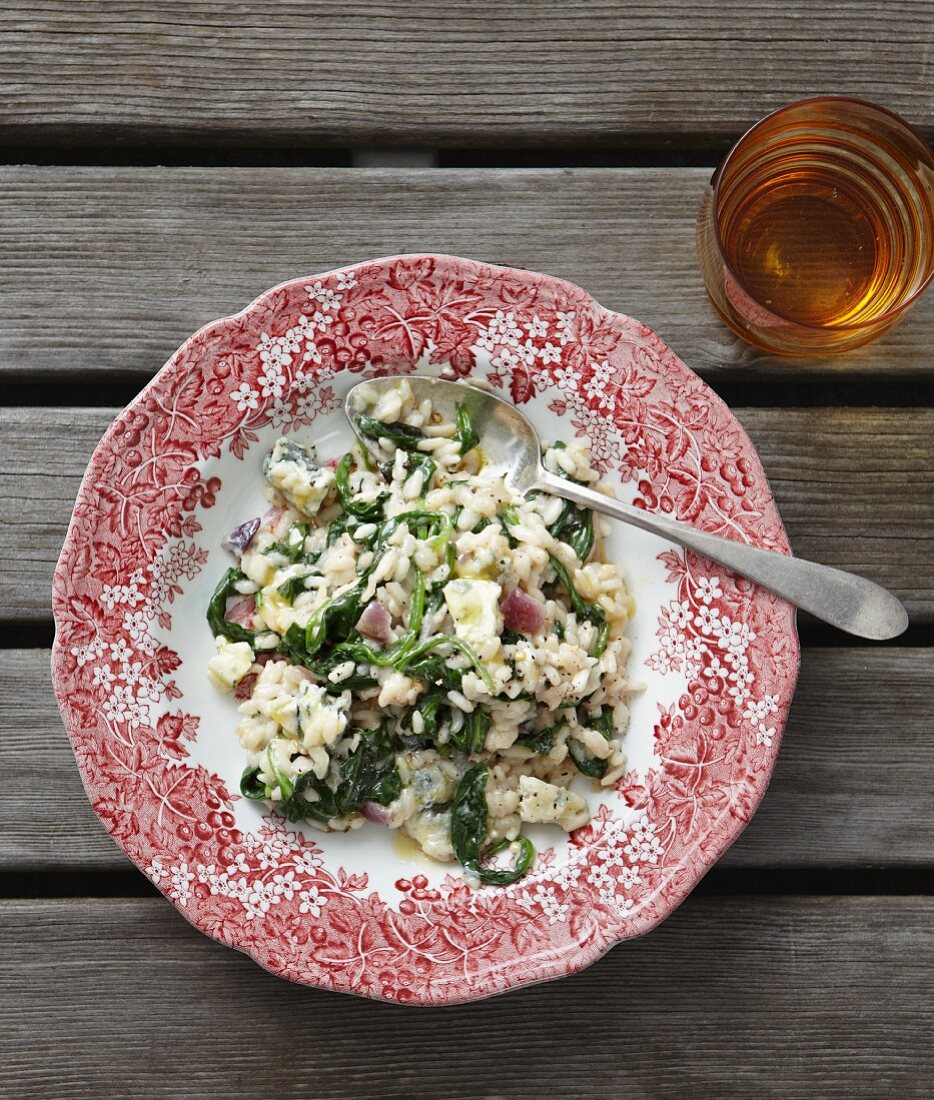 Spinach risotto with cheese (seen from above)