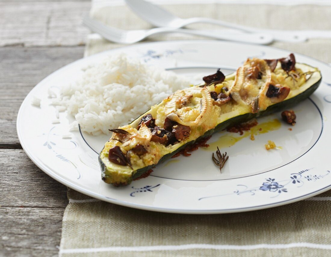 Stuffed courgettes with mushrooms and brie and a side of rice