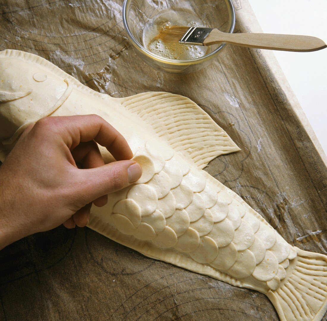 Preparing fish in pastry