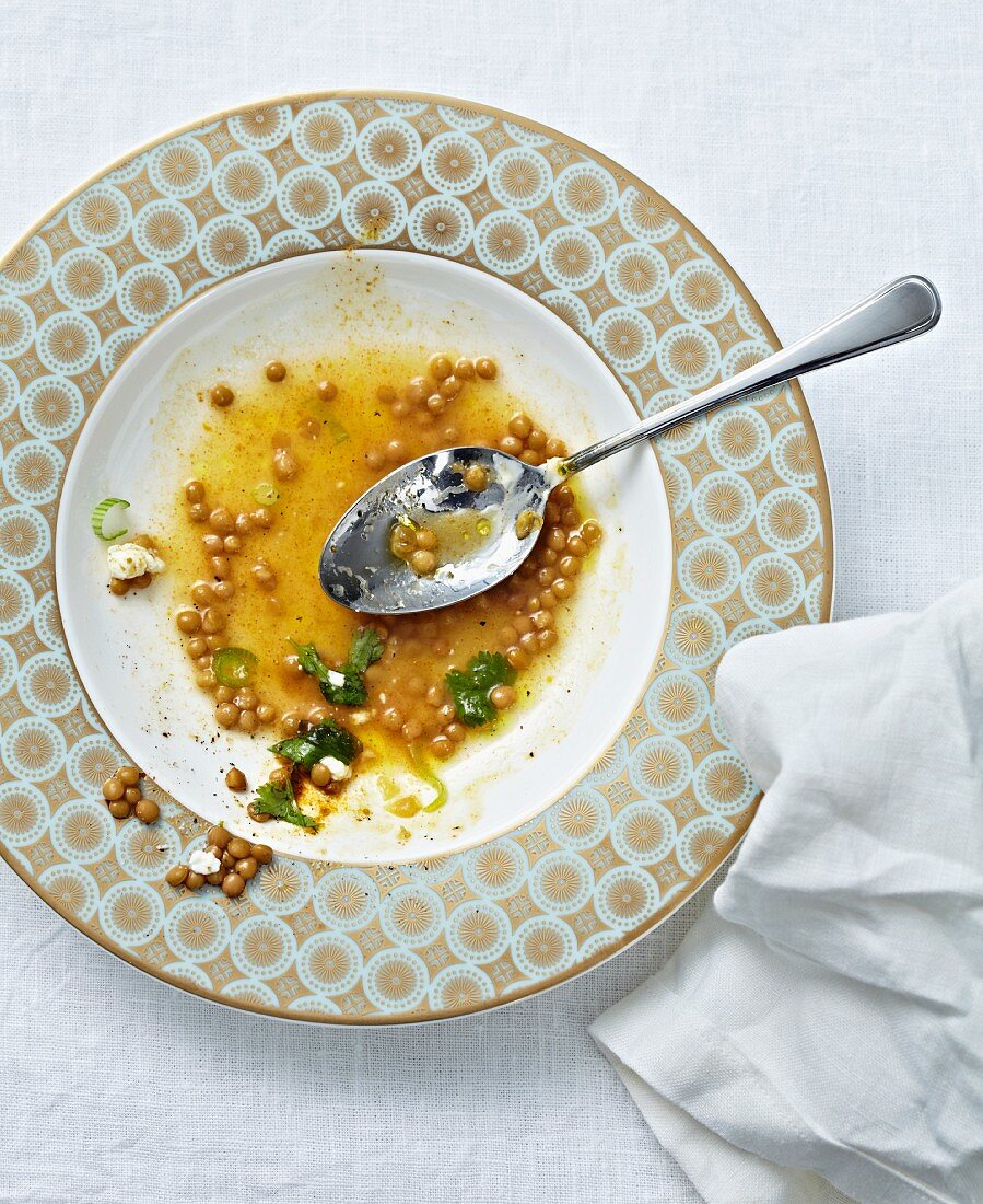 Remains of lentil curry and goat's cheese