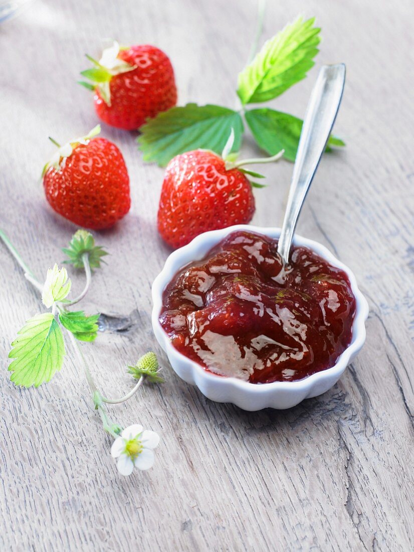 Strawberry jam and fresh strawberries