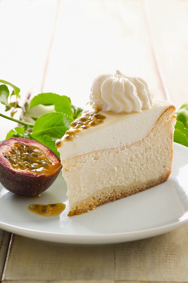A slice of cheese cake with passion fruit cream