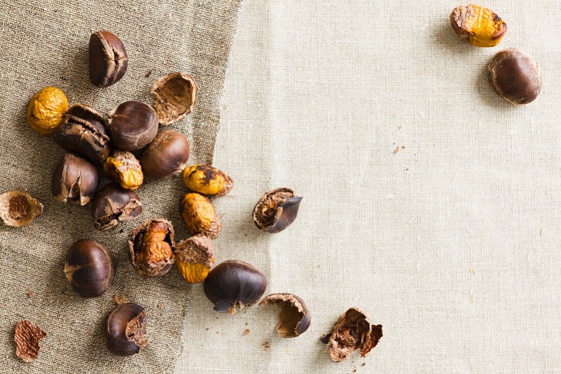 Roasted chestnut peeled and unpeeled (seen from above)