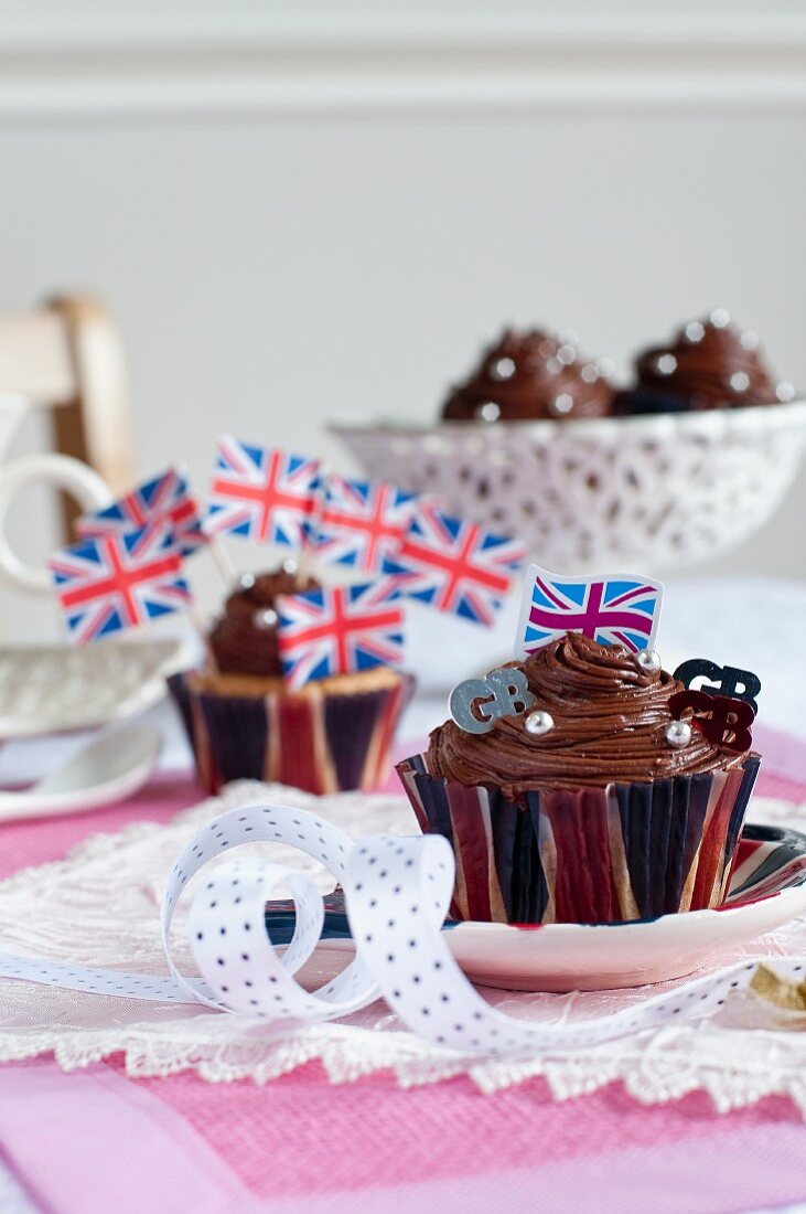 Chocolate Union Jack cupcakes on a table