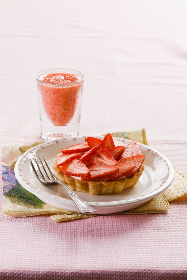 A strawberry tartlet with almond cream