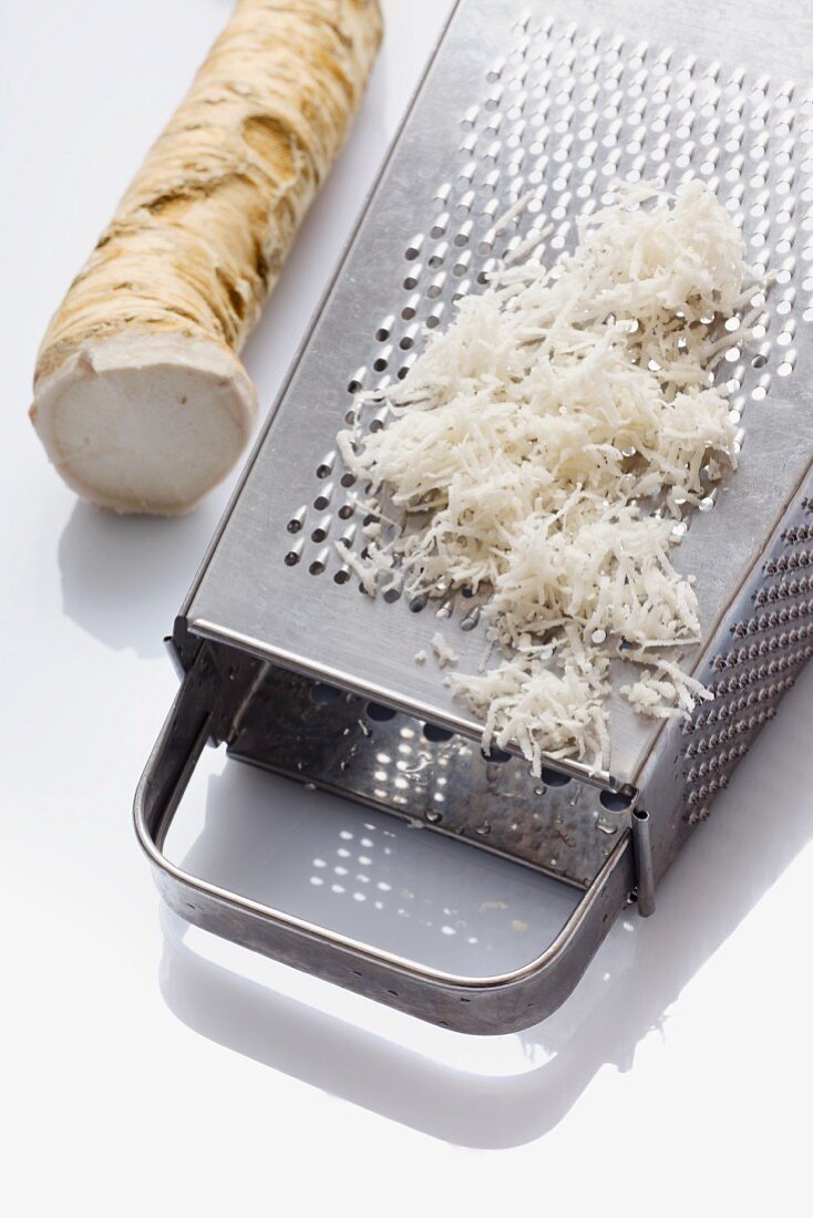 Horseradish, whole and grated with a grater