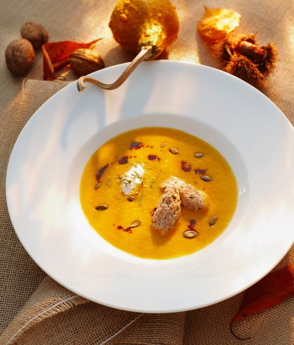 Cream of pumpkin soup with nut dumplings