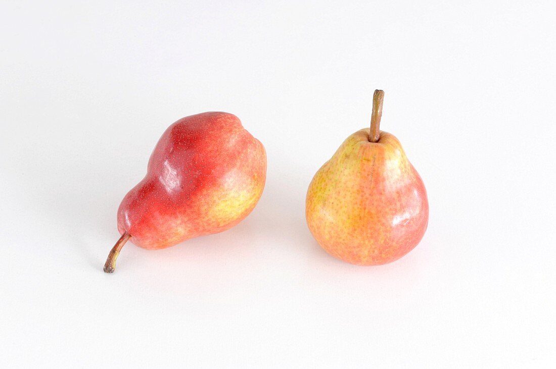 Two Red Bartlett pears