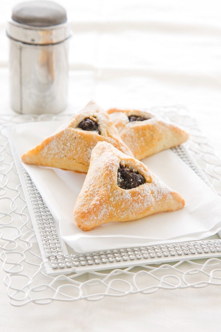 Hamantashen filled with poppyseeds, apples and almonds