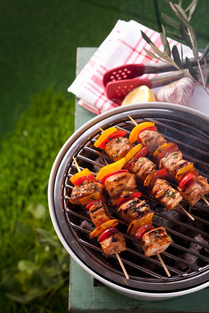 Chicken and pepper kebabs on a barbecue
