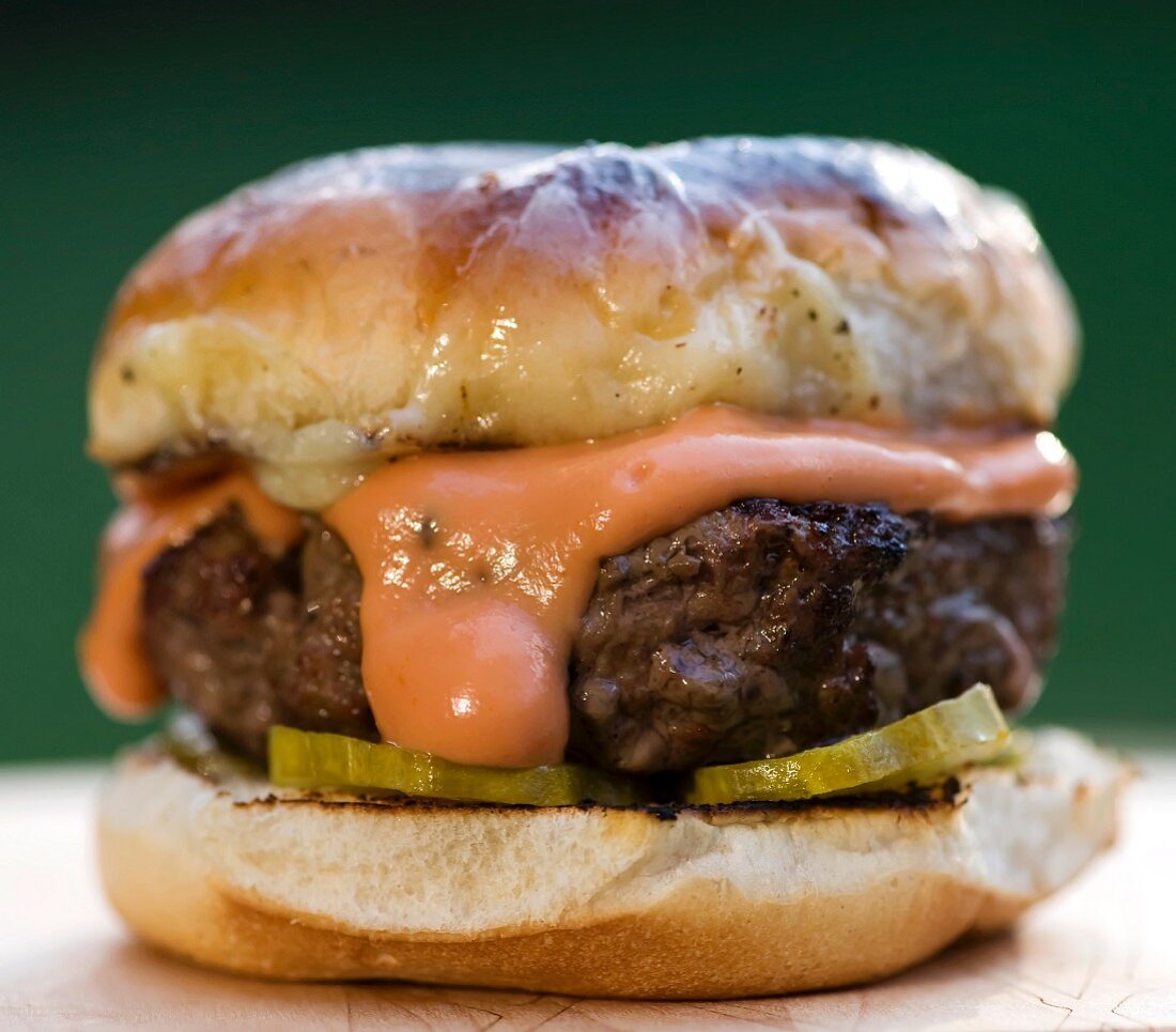 Grilled Hamburger with Creamy Ketchup and Pickles