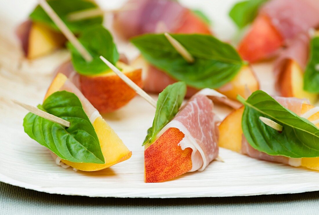 Peach Slices Wrapped with Ham and Basil; With Toothpicks