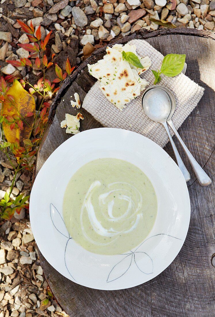 Cold avocado, basil and cucumber soup with chive bread