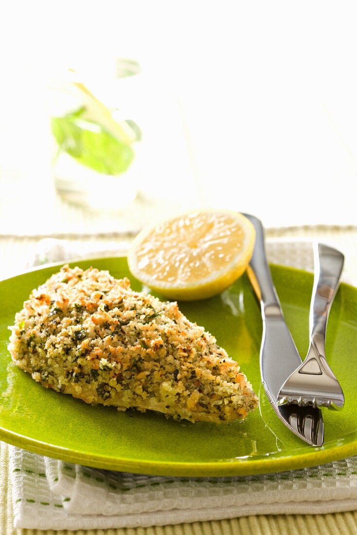 Fillet of fish with a herb crust and lemon