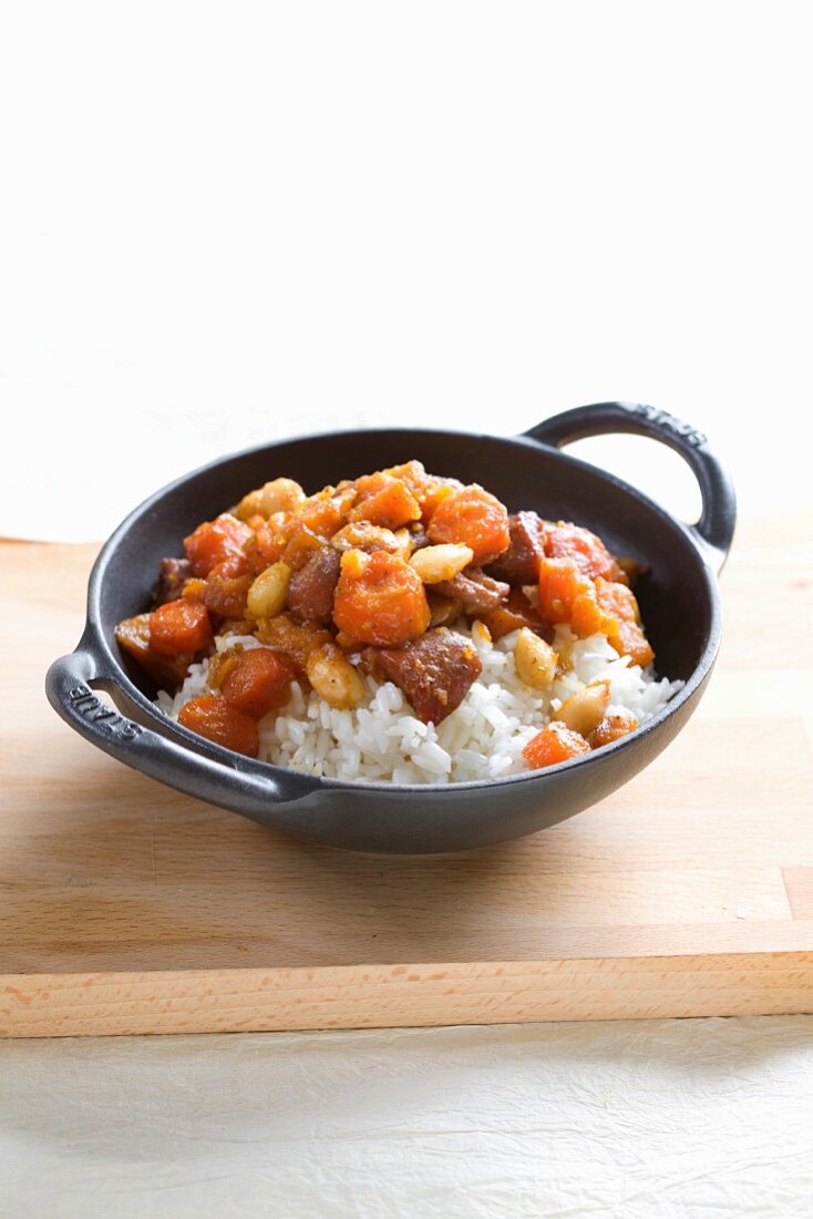 Chicken ragout with carrots, dried fruits and sweet potatoes