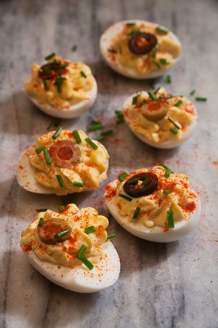 Deviled Eggs Topped with Black and Green Olives