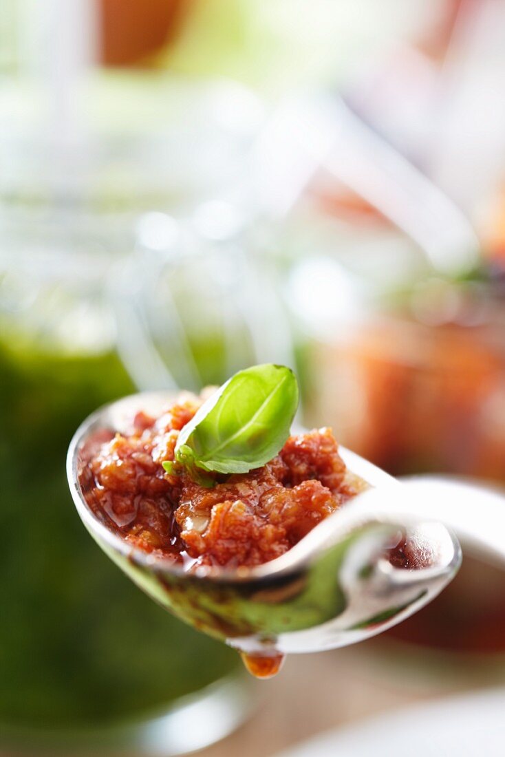 A spoonful of bolognese sauce (close-up)