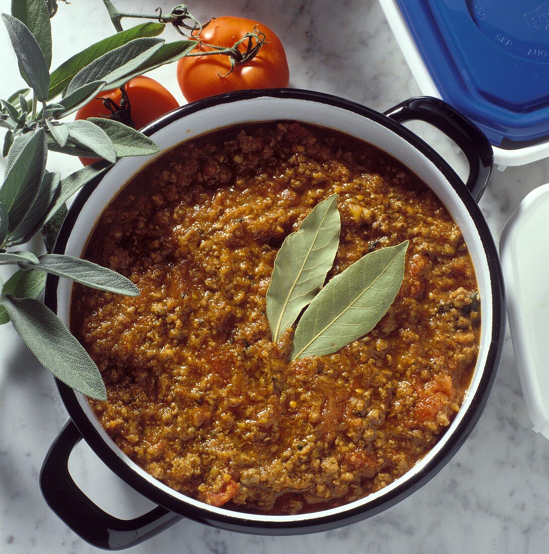 Ground Meat Sauce in a Pan with Fresh Sage