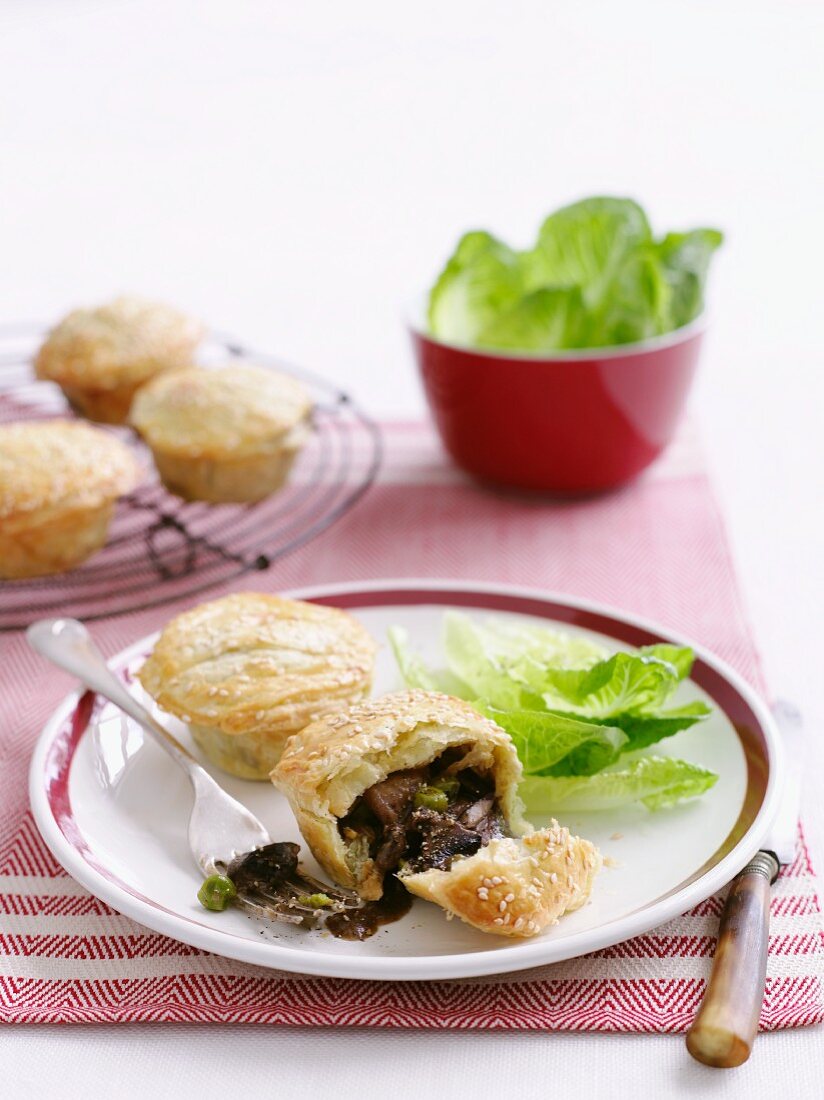 Beef pies with cos lettuce