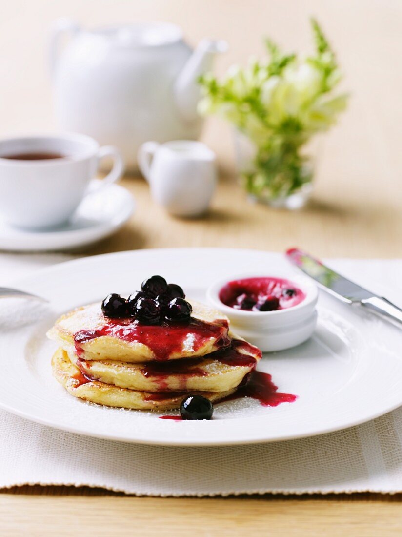 Pancakes with blueberry sauce