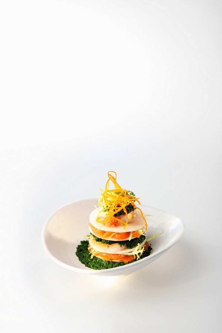 A salmon tower with egg and caviar