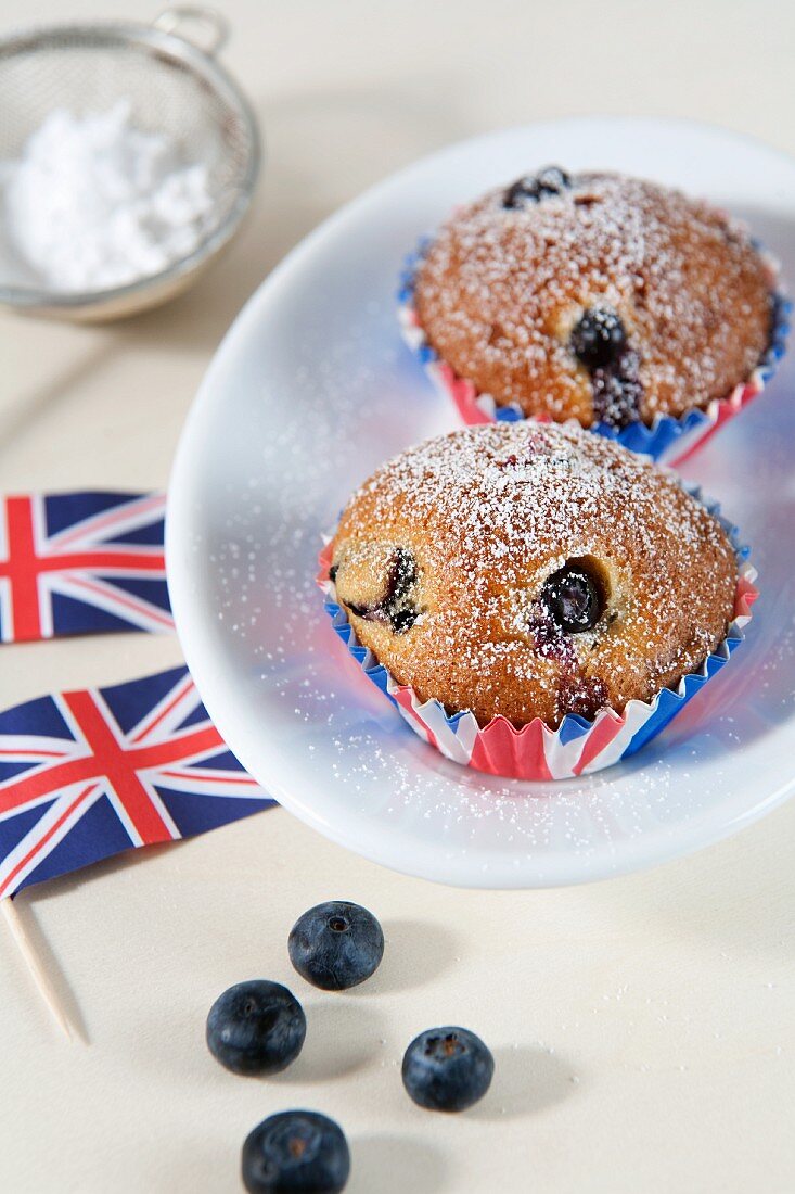 Blueberry muffins next to Union Jacks