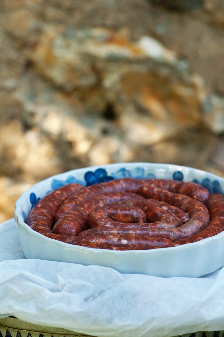 Barbecued sausages in a bowl