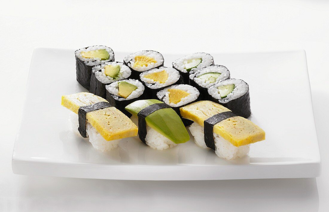 A sushi platter with maki and nigiri