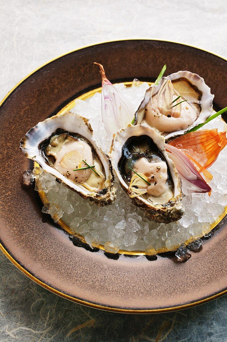 Oysters with shallot and vinegar foam