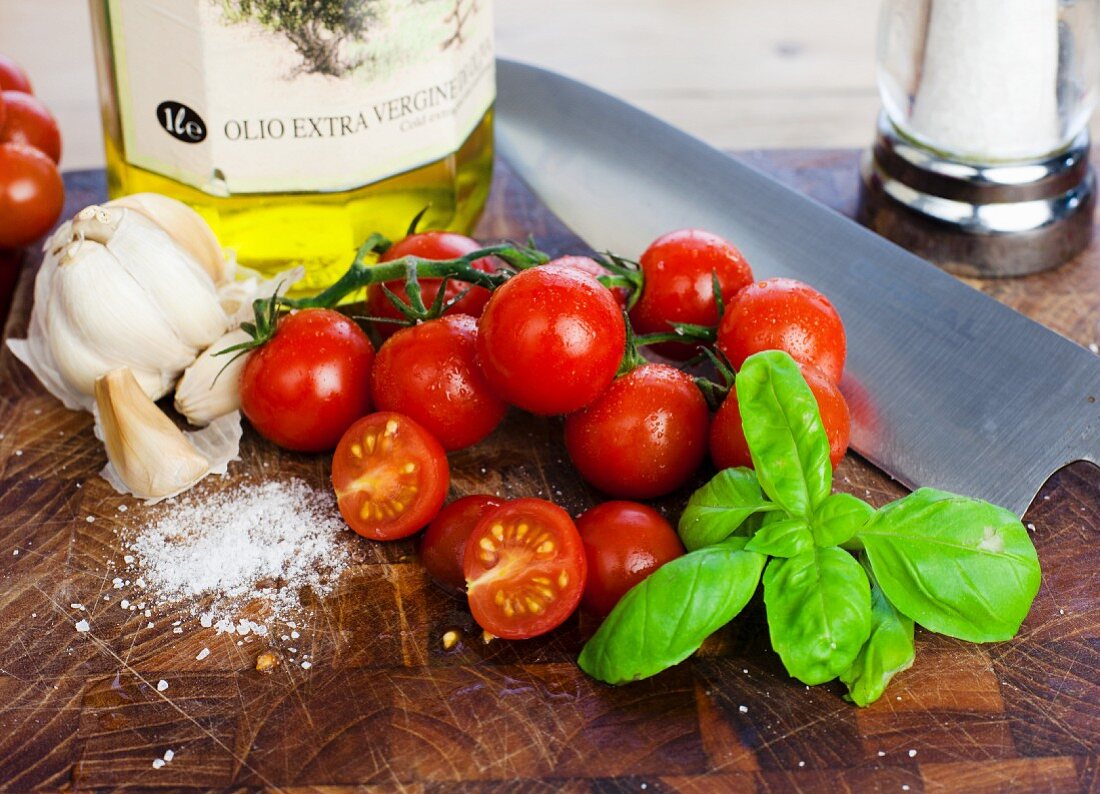 Cherry tomatoes, basil, salt, garlic and olive oil