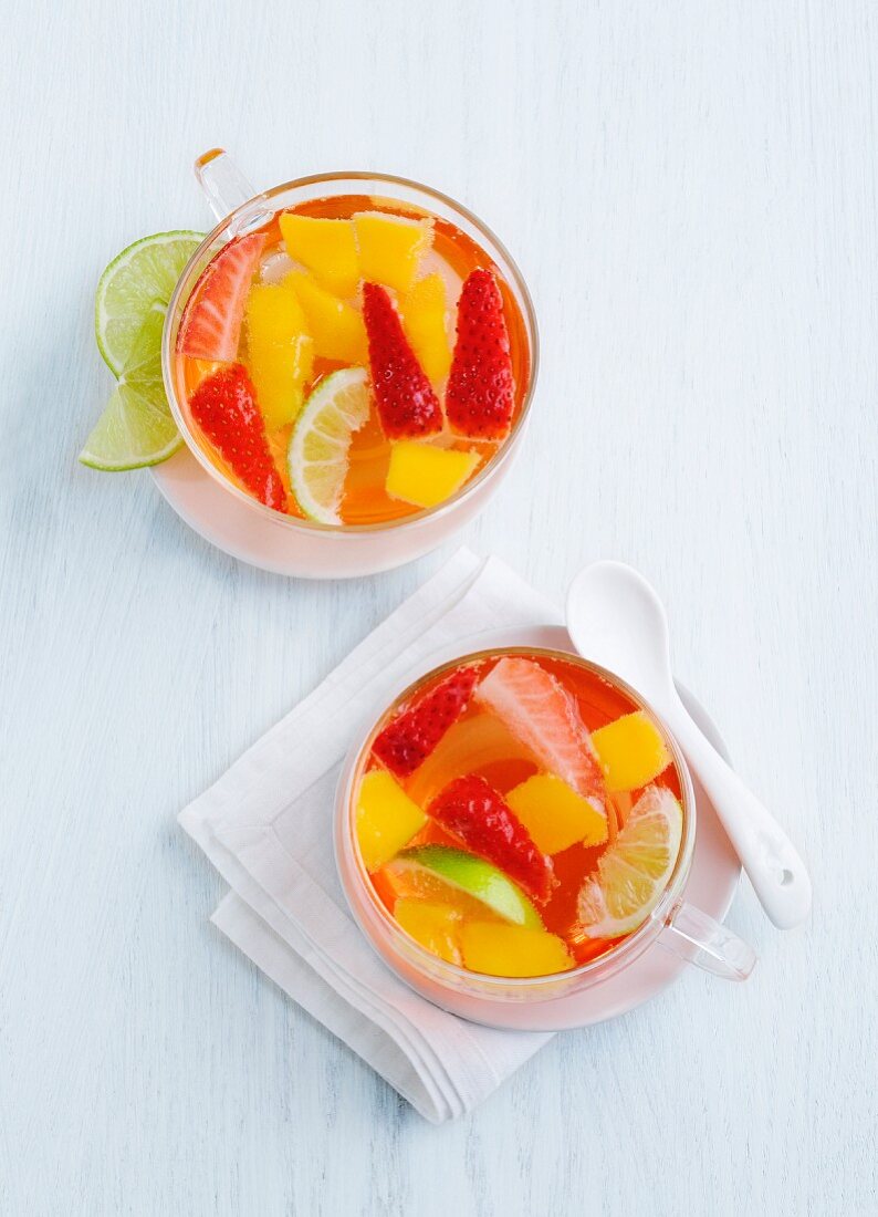 Fruit punch with strawberries and mango (seen from above)