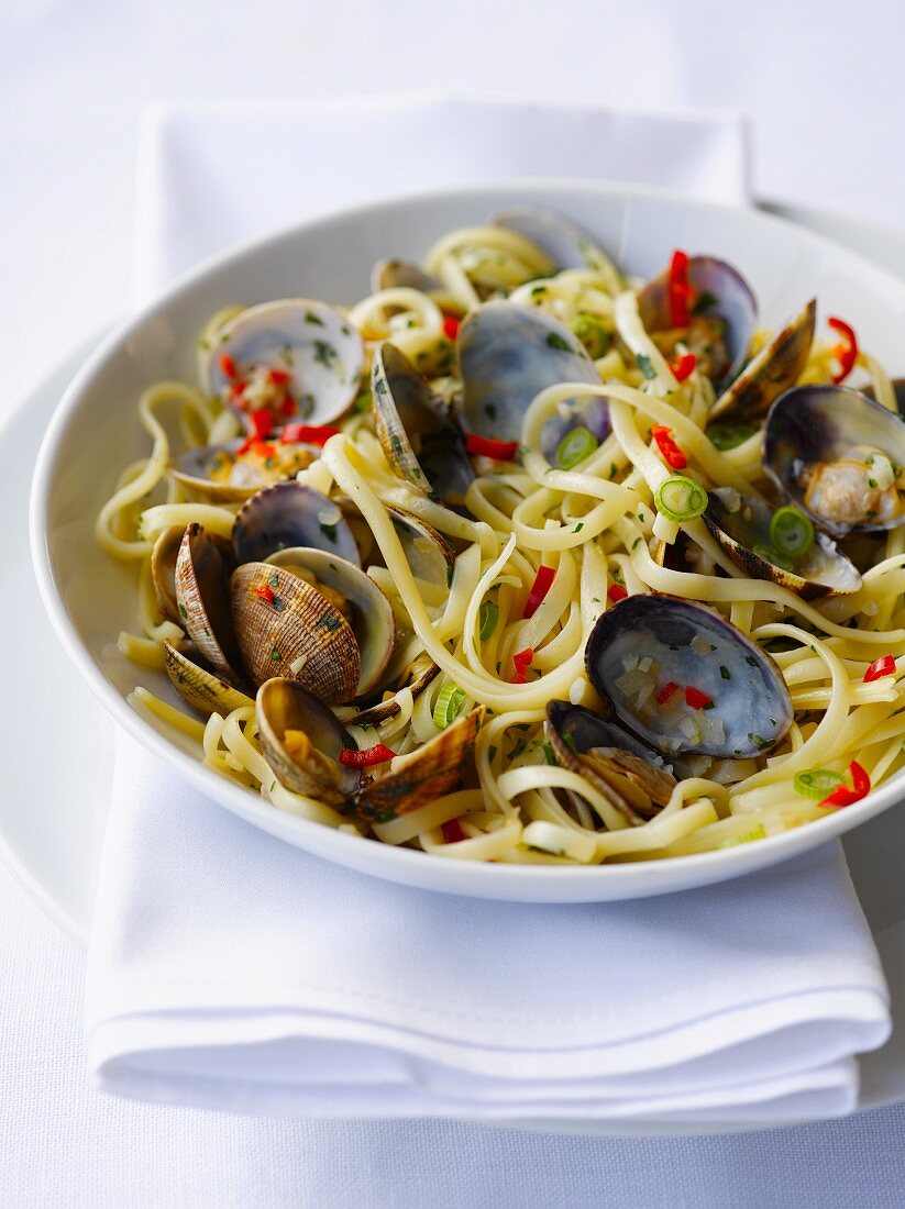 Linguine with mussels, spring onions and chilli peppers