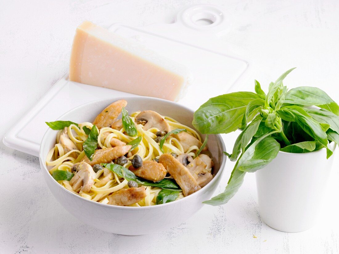 Tagliatelle with lemon chicken, mushrooms, capers and basil