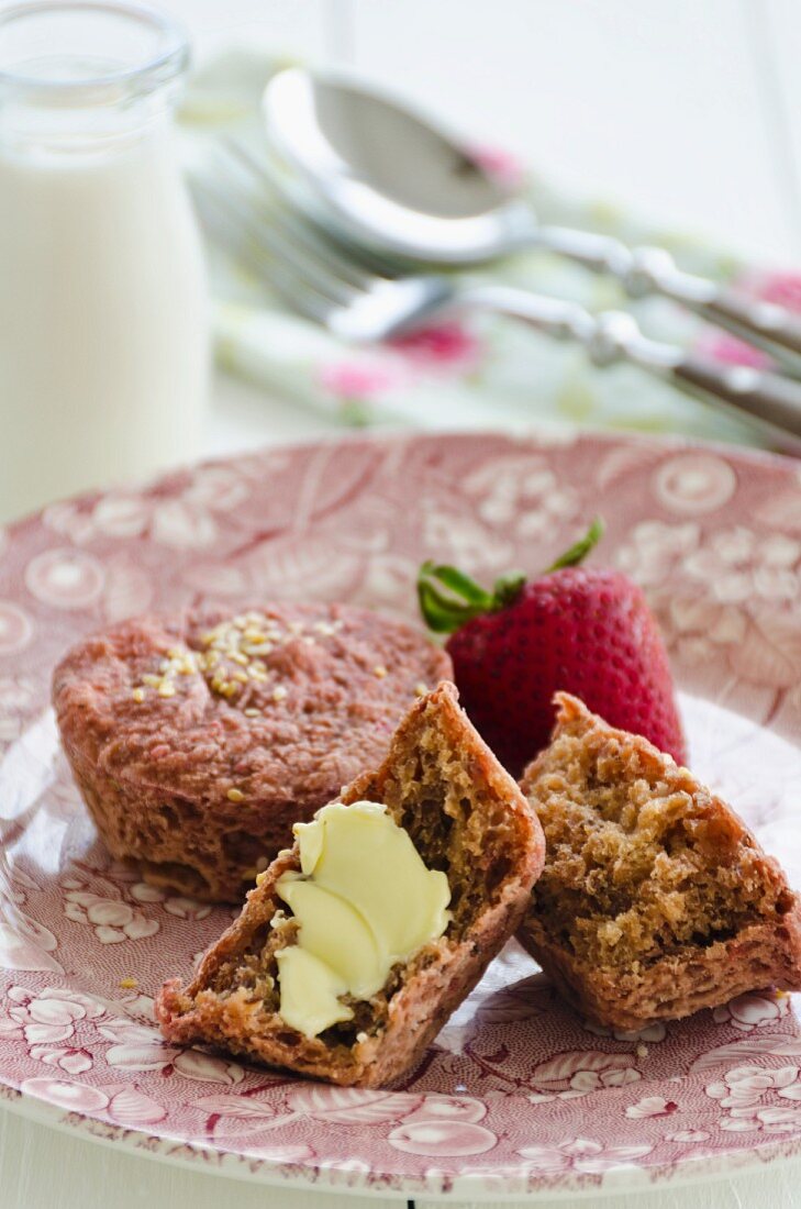 Beetroot muffins with butter and strawberries