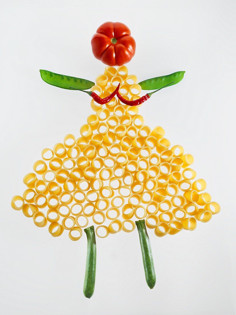 A woman made out of pasta and vegetables