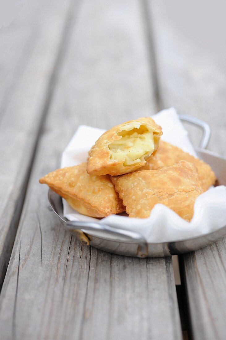 Tourtons (fried pastry pockets, France) filled with cheese