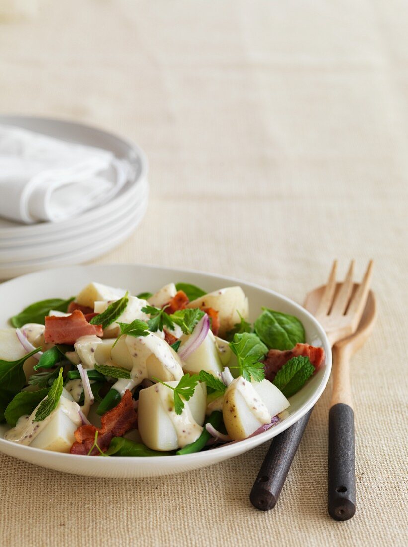 Potato salad with bacon and herbs