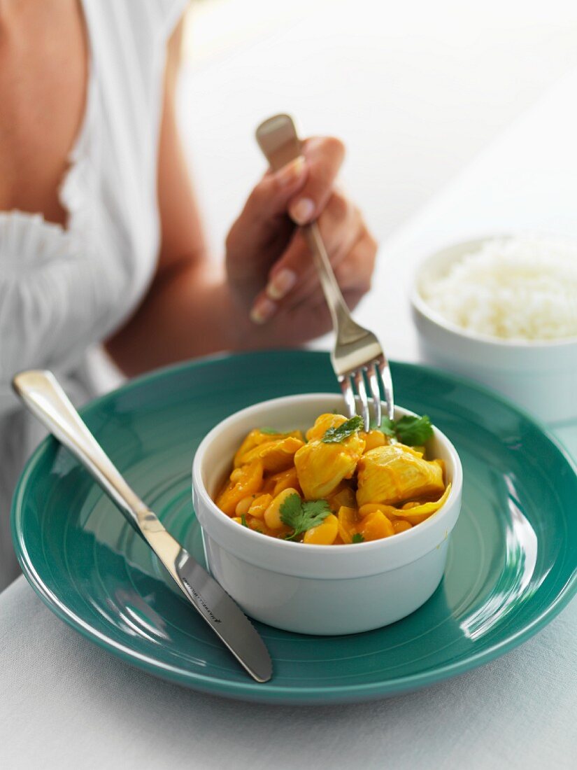 Yellow chicken curry with coriander