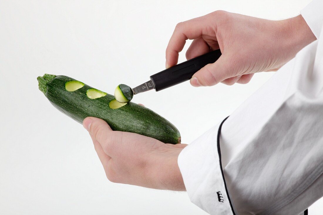 Courgette balls being scooped out