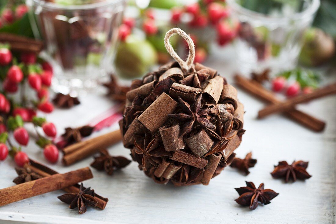 Scented pomander made of cinnamon sticks and star anise