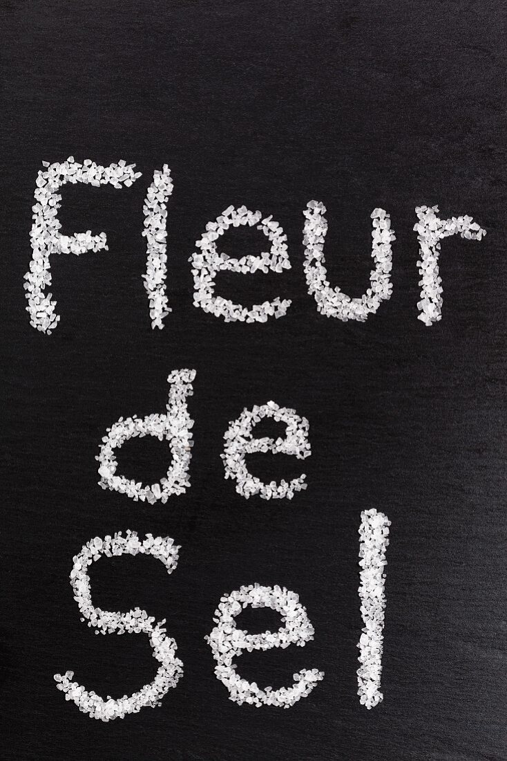 Fleur de sel written in coarse sea salt