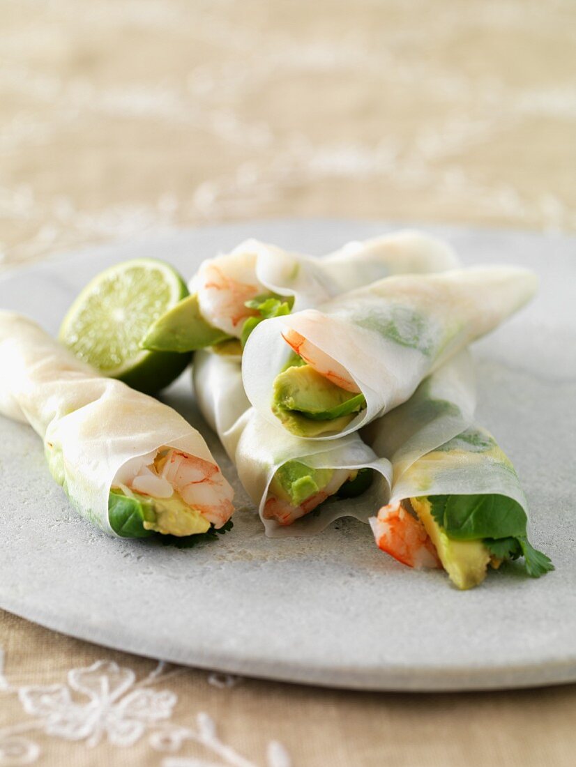 Rice paper rolls with avocado, limes and king prawns