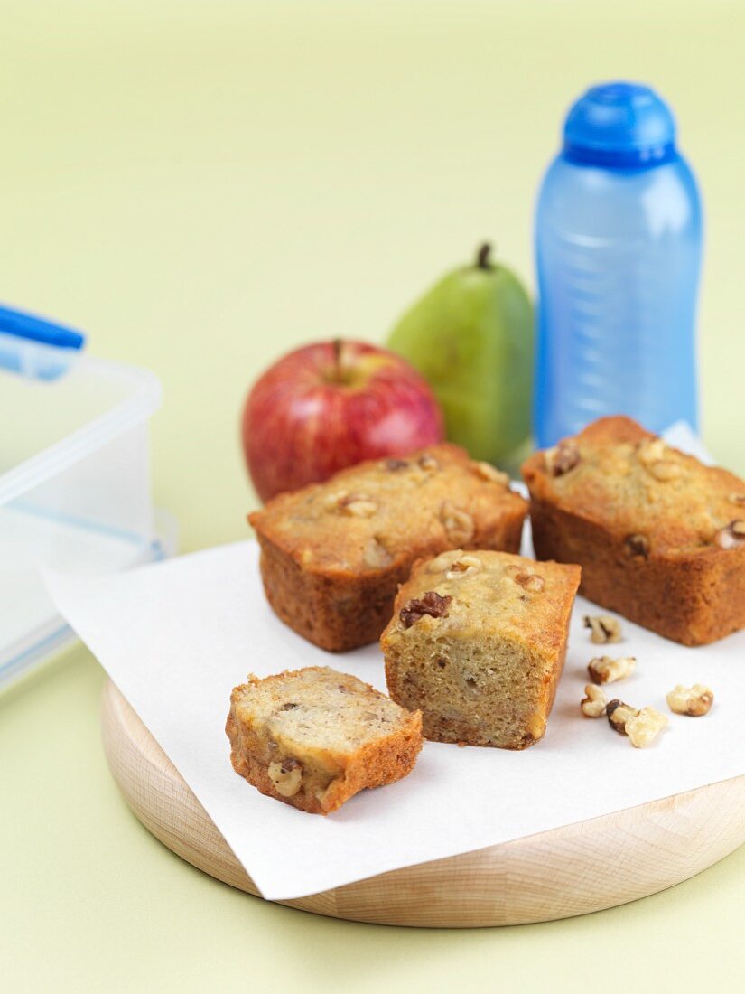 Banana and honey bread and fruit with a lunchbox