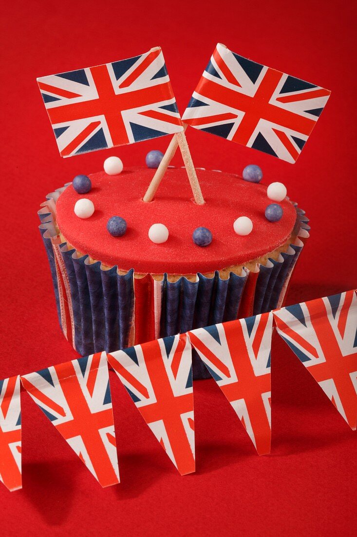 A cupcake decorated with Union Jacks