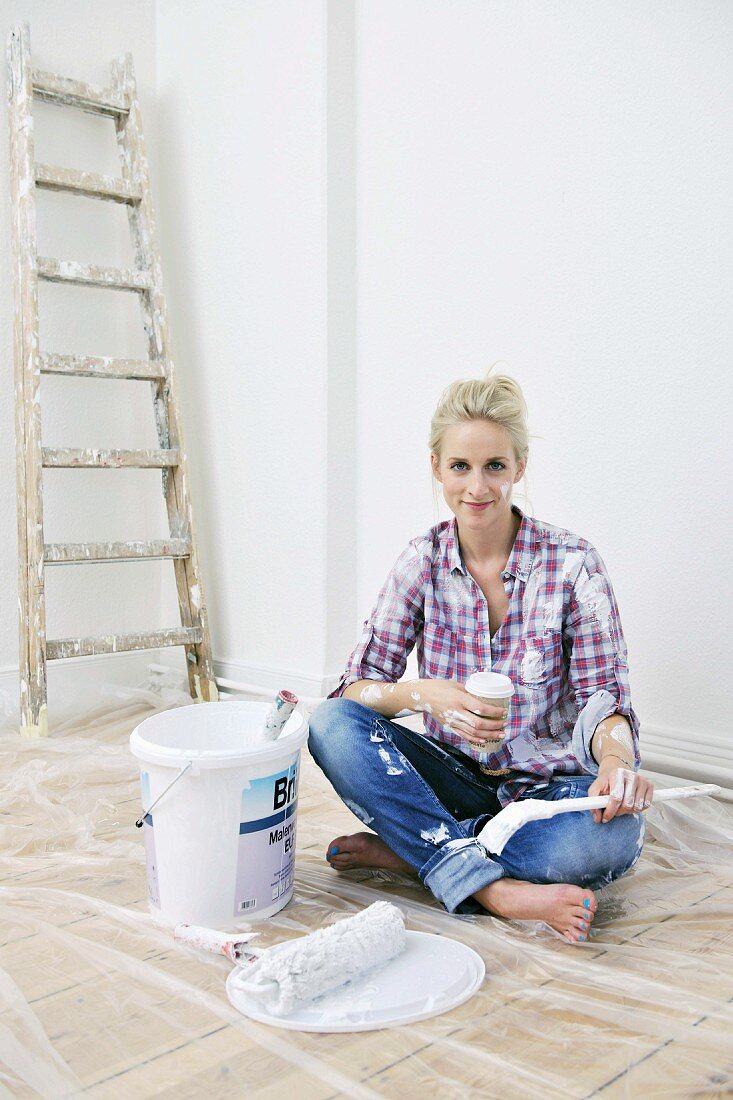 Renovating - woman taking a break