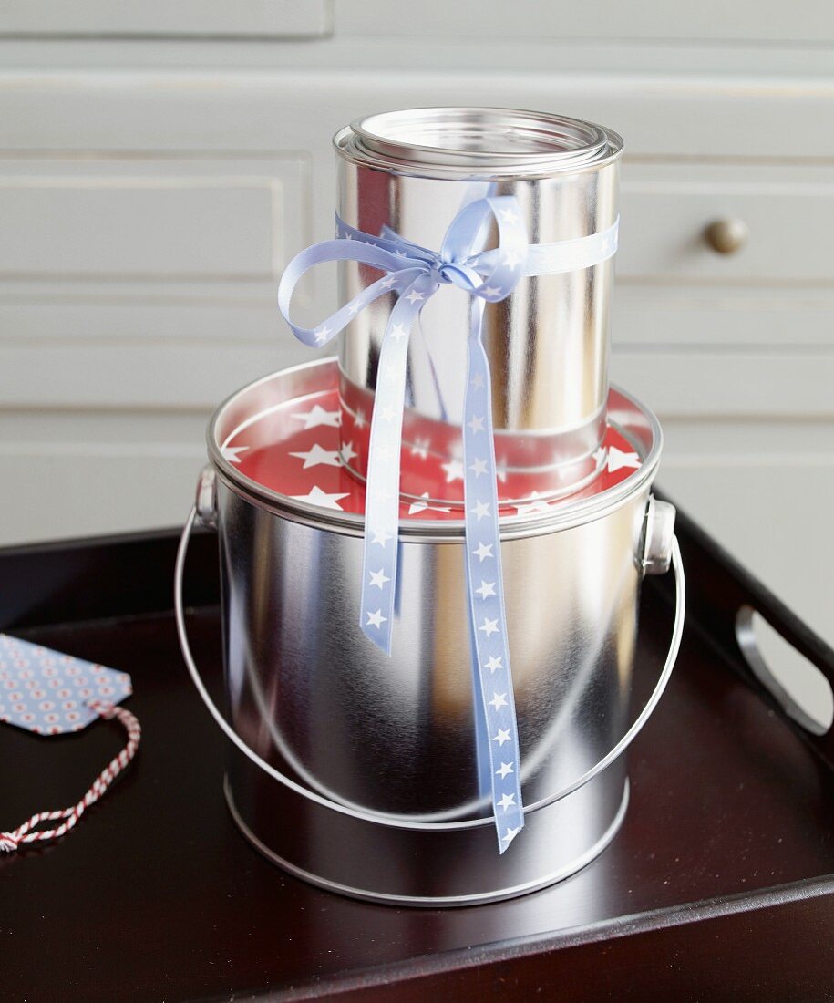 Two buckets with gift ribbon