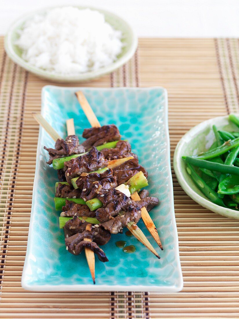 Beef kebabs with spring onions
