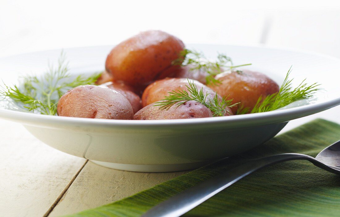 Roasted Whole Potatoes in a Bowl with Dill