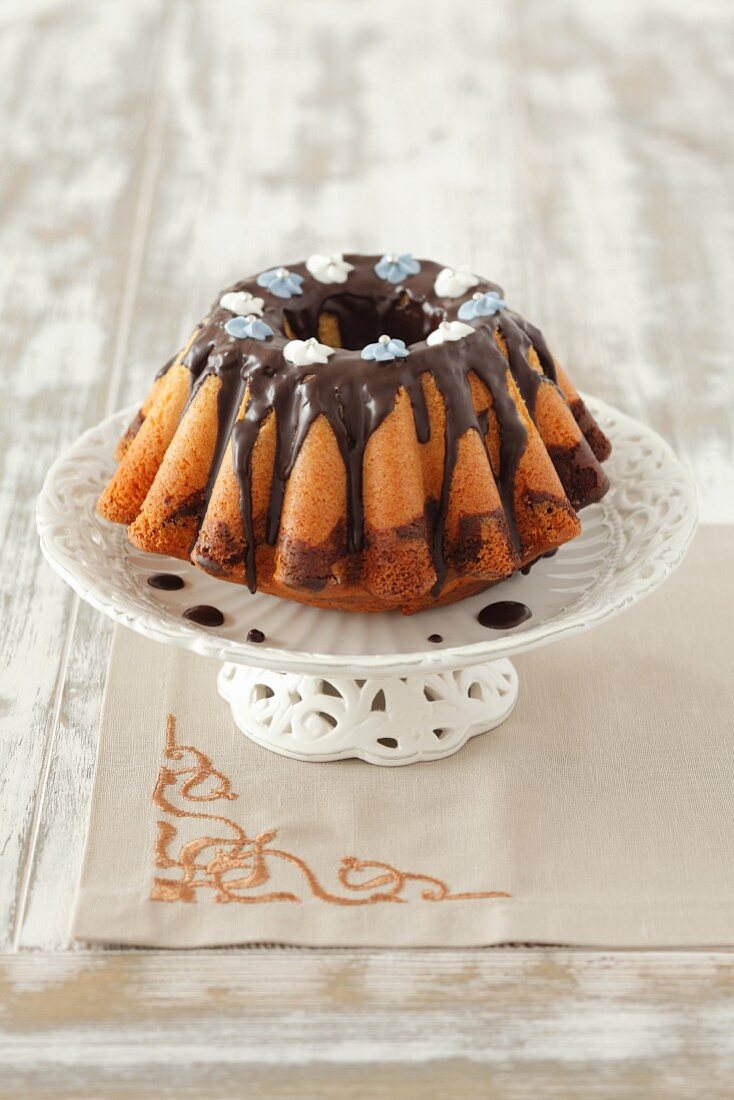 A marble cake with chocolate glaze