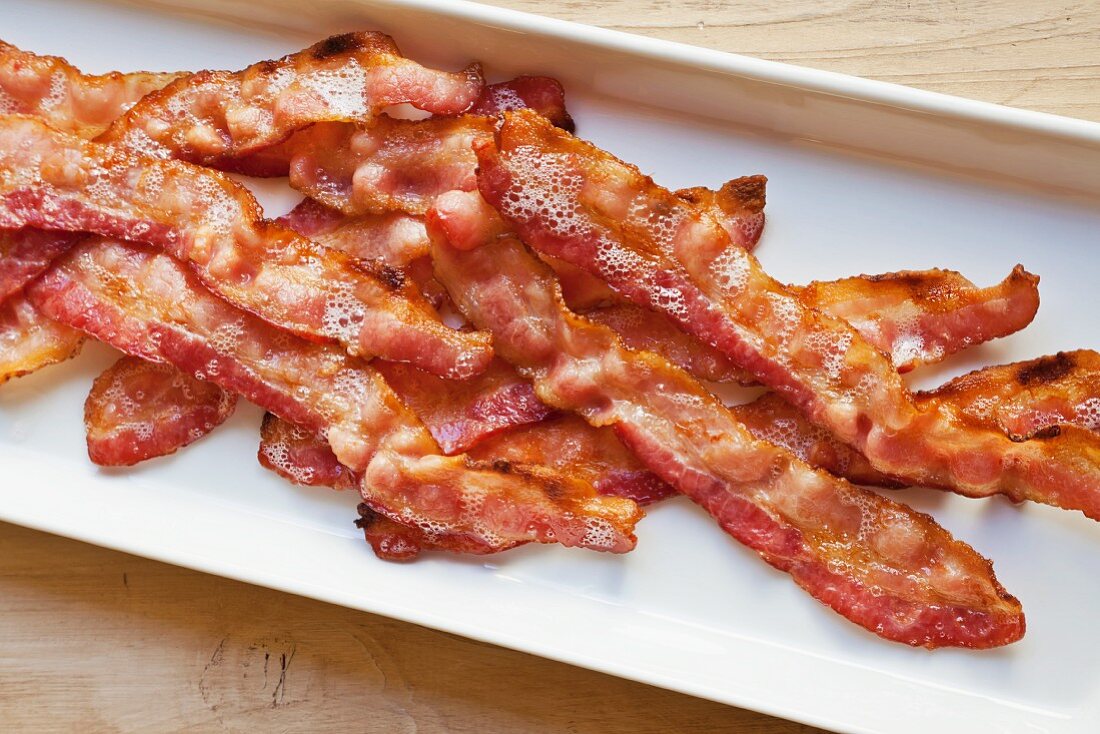 Oven Broiled Bacon in a White Serving Platter